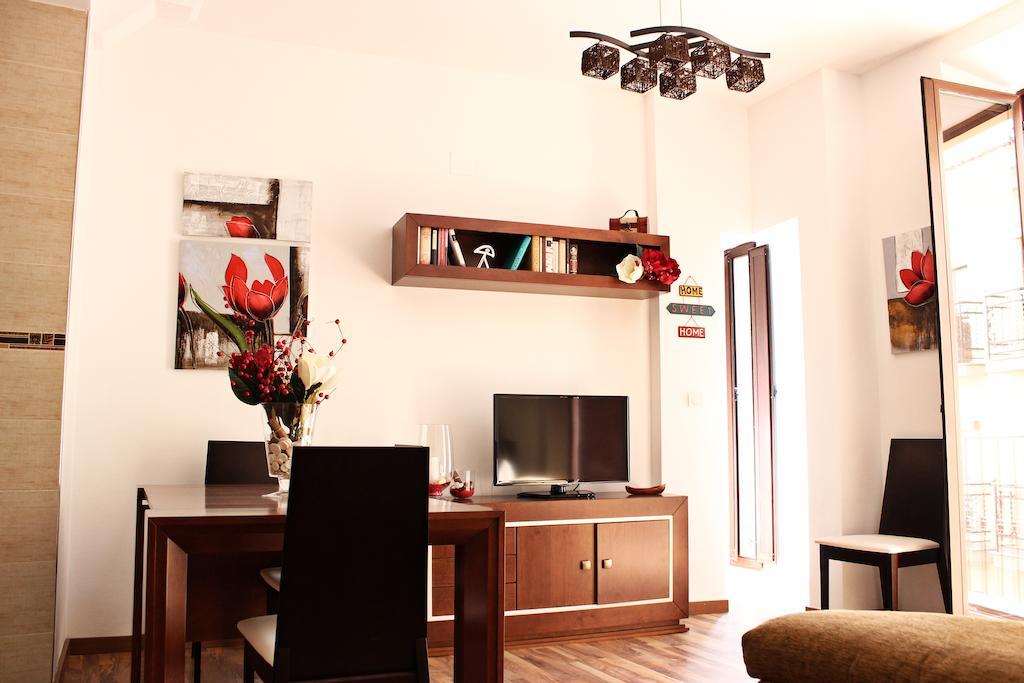 Apartamentos Casa De La Lonja Granada Room photo